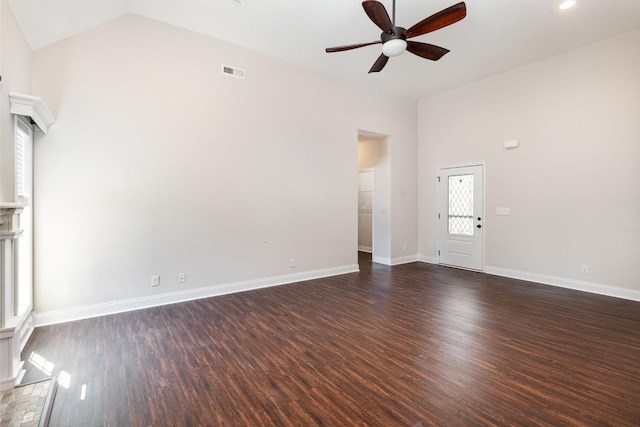 unfurnished living room featuring visible vents, baseboards, high vaulted ceiling, a ceiling fan, and dark wood-style flooring