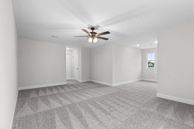 spare room featuring visible vents, baseboards, carpet, ceiling fan, and recessed lighting