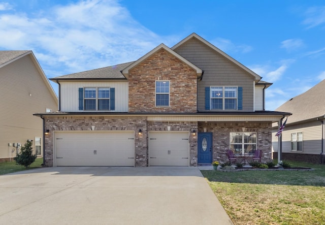 view of front of home featuring driveway, a front lawn, covered porch, a garage, and brick siding