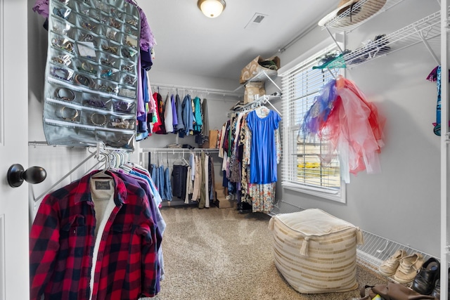 spacious closet featuring visible vents