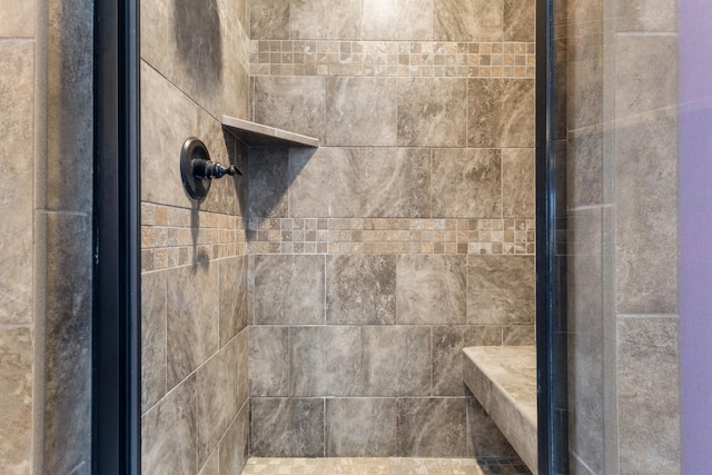 details featuring a tile shower