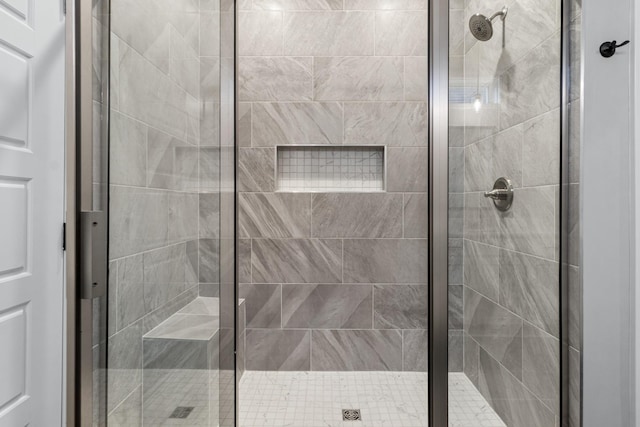 full bath featuring a stall shower