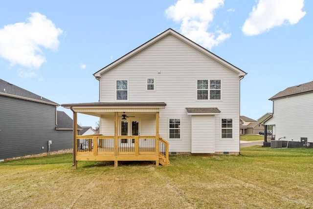 rear view of property featuring a ceiling fan, central AC unit, a yard, crawl space, and a deck