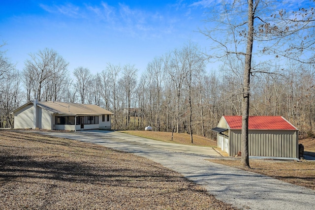 view of street featuring driveway