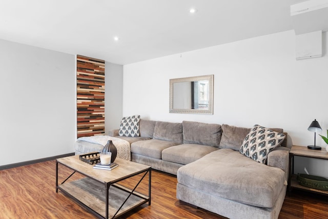 living area featuring recessed lighting, baseboards, and wood finished floors