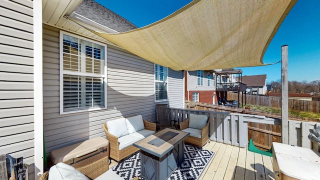 deck with an outdoor hangout area