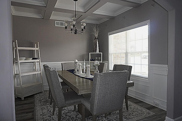 dining space featuring beam ceiling, a notable chandelier, visible vents, and dark wood-style flooring