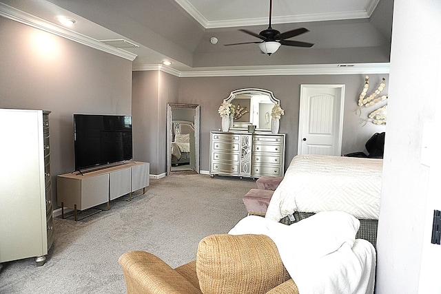 carpeted bedroom featuring crown molding, baseboards, a tray ceiling, recessed lighting, and a ceiling fan