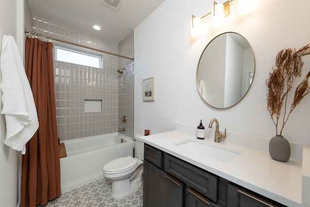 bathroom with tile patterned floors, visible vents, shower / bath combo with shower curtain, toilet, and vanity