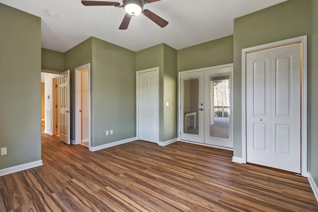 unfurnished bedroom featuring wood finished floors, access to outside, french doors, and baseboards