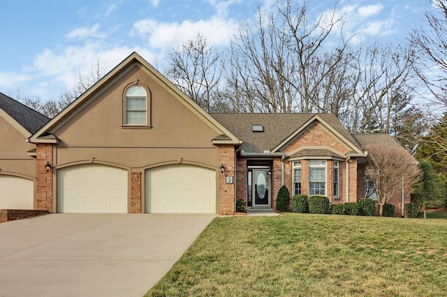 view of front facade featuring brick siding, a front lawn, concrete driveway, stucco siding, and a garage