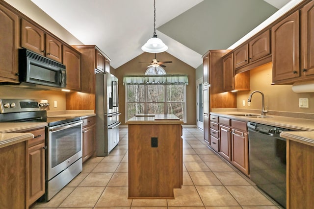 kitchen with black appliances, a sink, a kitchen island, light tile patterned floors, and lofted ceiling