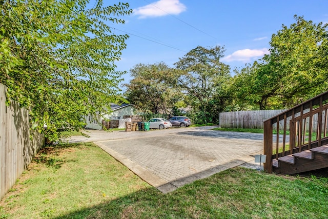 view of yard with fence