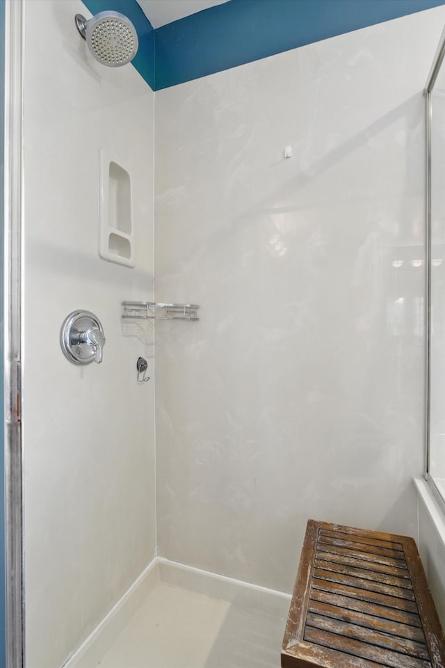 full bath featuring walk in shower