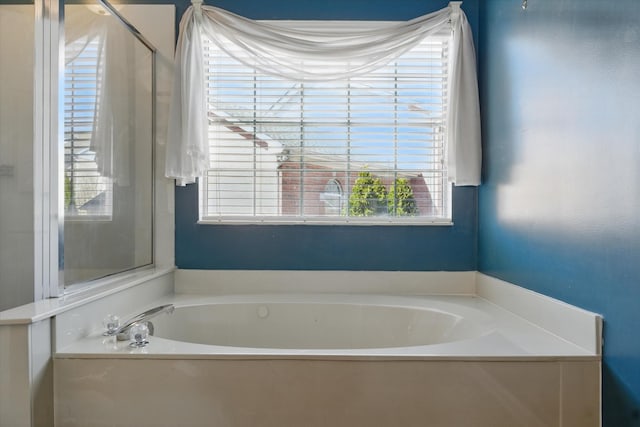 full bathroom featuring a bath