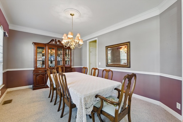 dining space with visible vents, light carpet, a notable chandelier, and baseboards