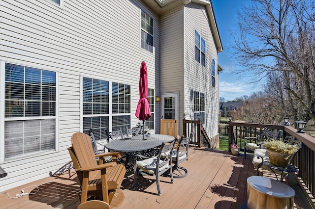 deck featuring outdoor dining space