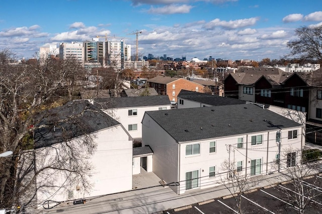 birds eye view of property featuring a view of city