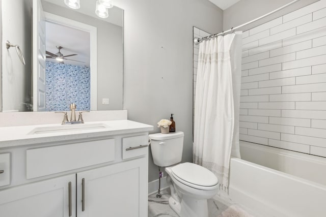 full bathroom featuring toilet, marble finish floor, shower / tub combo with curtain, a ceiling fan, and vanity