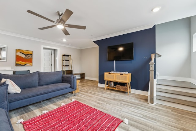 living room featuring recessed lighting, wood finished floors, baseboards, and ornamental molding