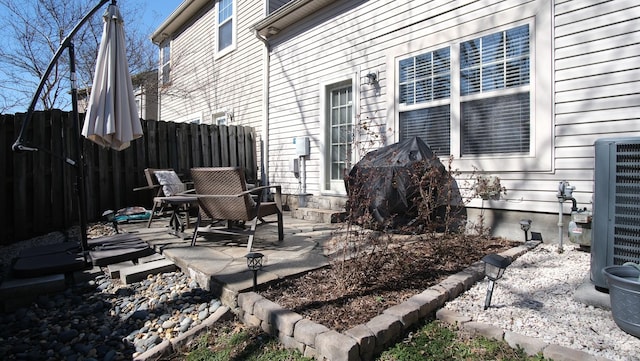 view of patio with fence