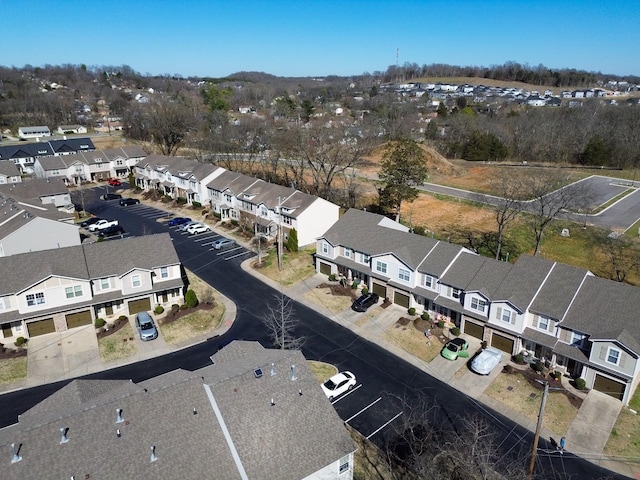 birds eye view of property with a residential view