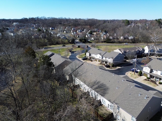 birds eye view of property with a residential view