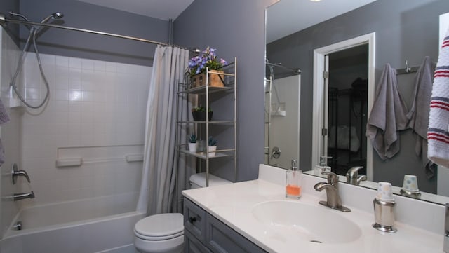 full bathroom with vanity, toilet, and shower / bath combo