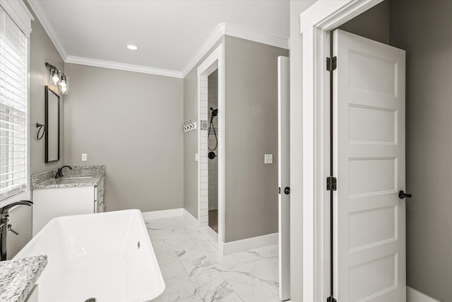 full bath featuring marble finish floor, ornamental molding, baseboards, tiled shower, and vanity