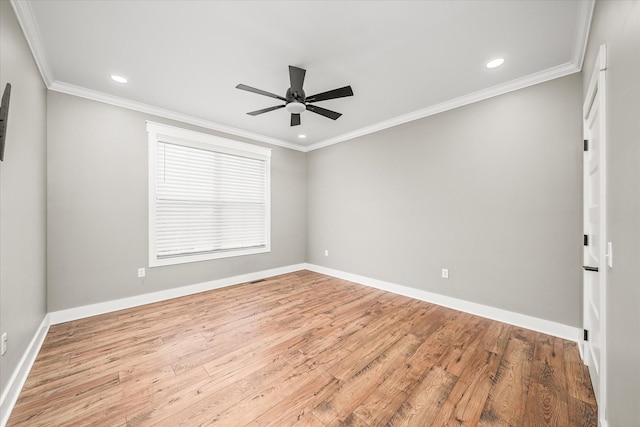 unfurnished room featuring recessed lighting, crown molding, baseboards, and wood finished floors