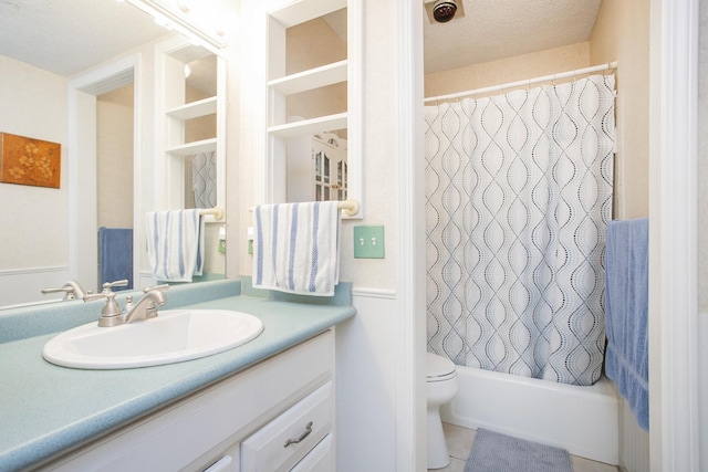 bathroom featuring vanity, tile patterned flooring, a textured ceiling, toilet, and shower / tub combo with curtain