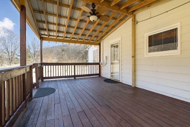 wooden deck with ceiling fan