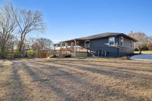 view of home's exterior with crawl space and brick siding