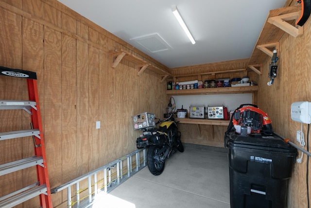 storage room featuring attic access