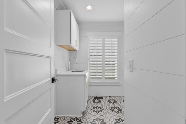 bathroom featuring vanity and recessed lighting