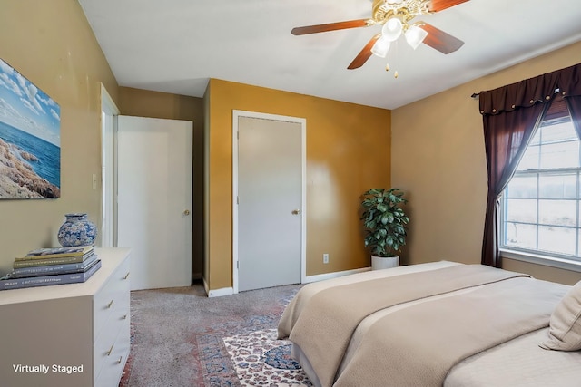 bedroom with baseboards, light carpet, and ceiling fan