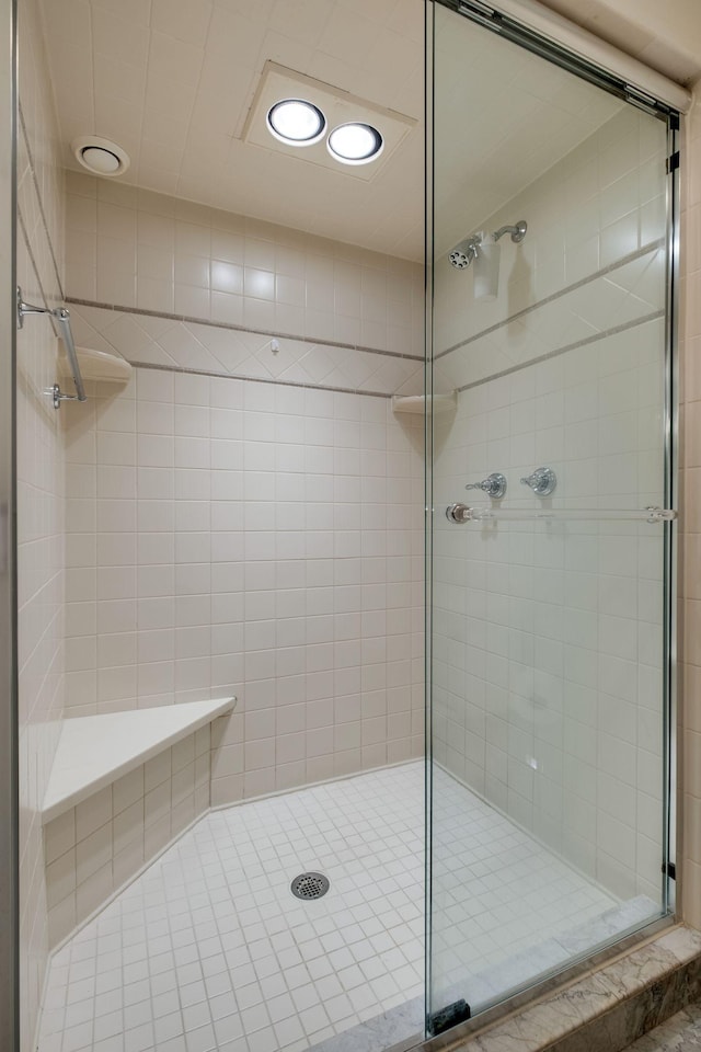 full bathroom featuring a shower stall