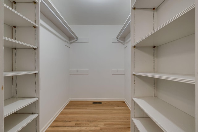 spacious closet with visible vents and light wood finished floors