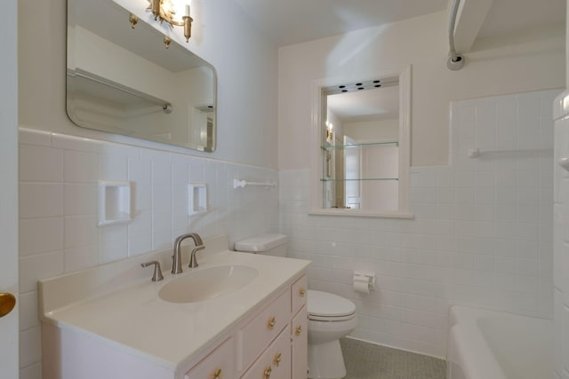 bathroom with tile patterned flooring, tile walls, toilet, shower / bath combination, and vanity