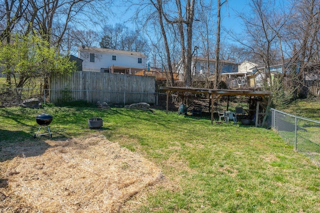 view of yard featuring fence