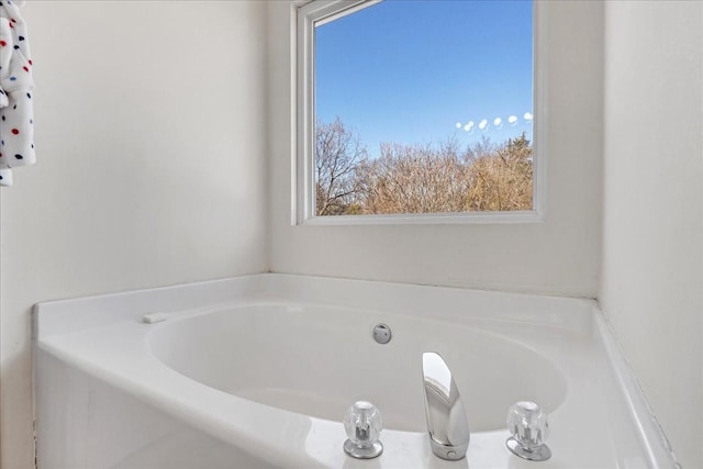 full bath featuring a garden tub