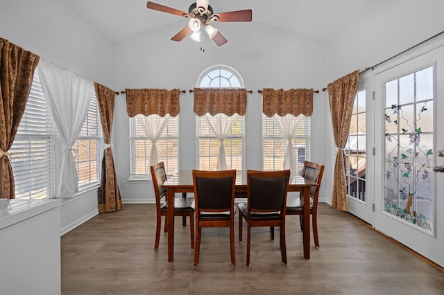 sunroom / solarium featuring ceiling fan and lofted ceiling