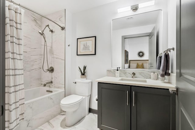 bathroom featuring vanity, baseboards, shower / tub combo, toilet, and marble finish floor