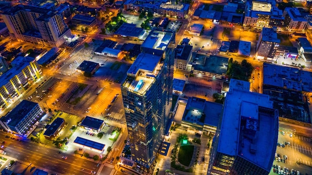 birds eye view of property featuring a city view