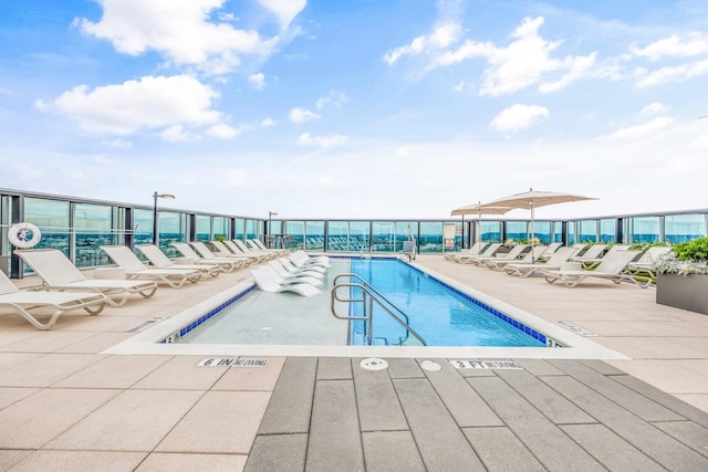 pool with a patio area