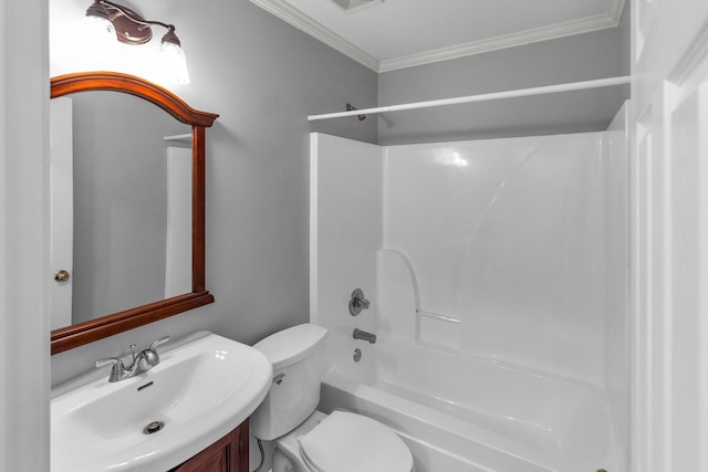 bathroom featuring bathing tub / shower combination, vanity, ornamental molding, and toilet