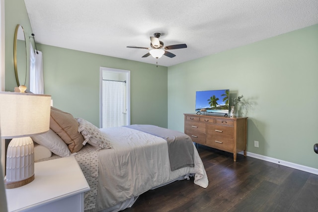 bedroom with baseboards, a textured ceiling, wood finished floors, and a ceiling fan