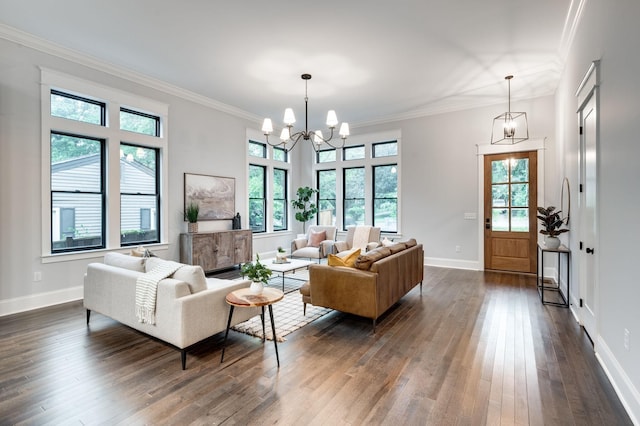 living area with dark wood finished floors, an inviting chandelier, crown molding, and baseboards