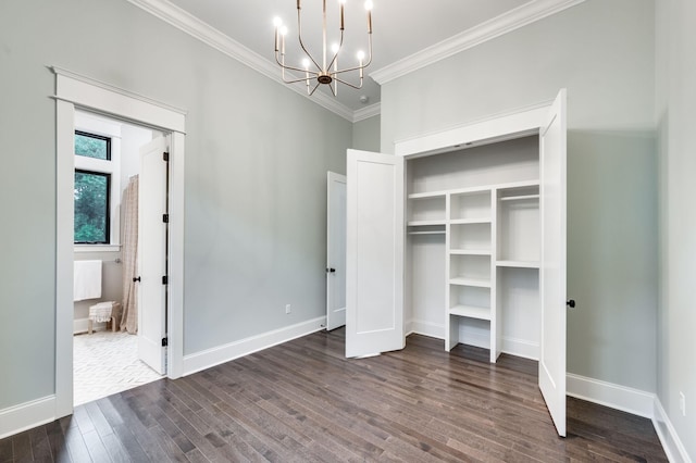 unfurnished bedroom featuring baseboards, a notable chandelier, dark wood-style floors, and ornamental molding