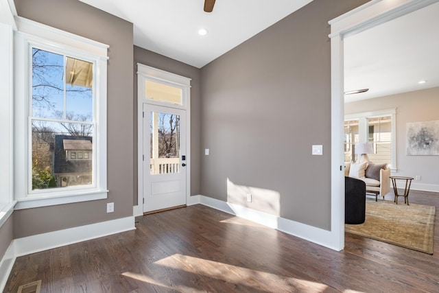 entrance foyer with visible vents, ceiling fan, baseboards, recessed lighting, and wood finished floors